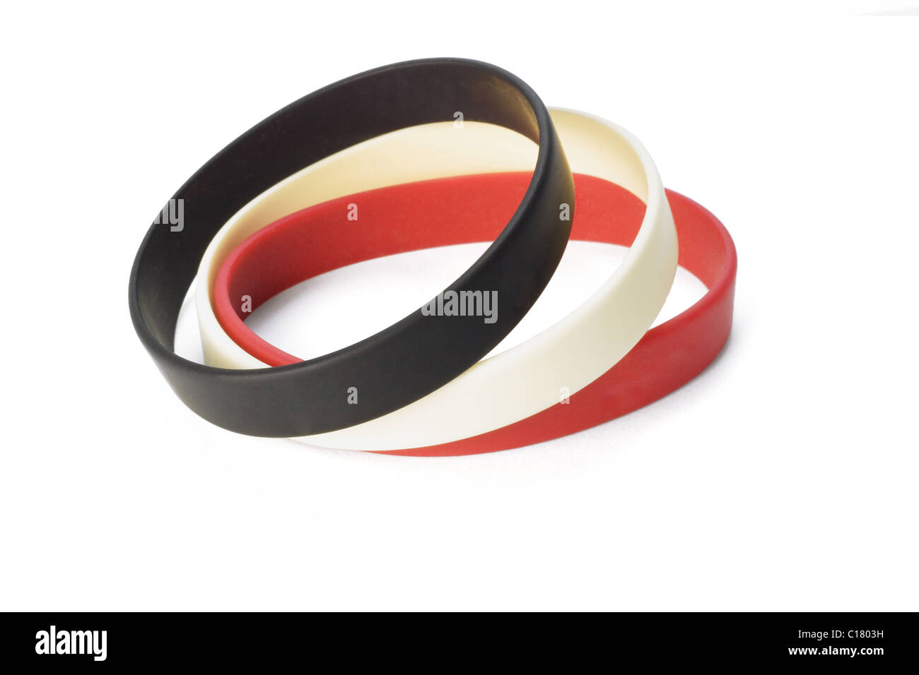 Les bracelets élastiques colorés sur fond blanc Banque D'Images