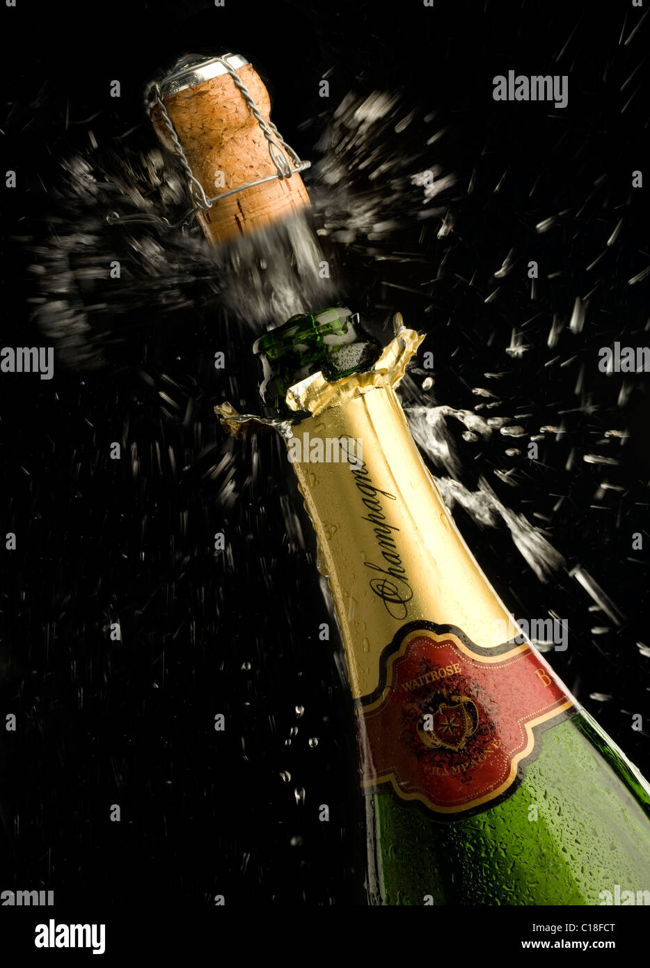 Bouteille de champagne cork popping Banque D'Images