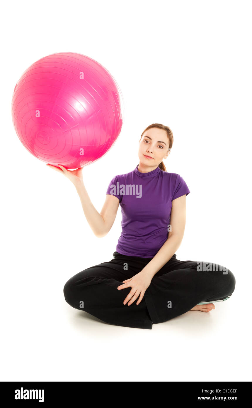 Femme avec ballon rose l'exercice isolated on white Banque D'Images