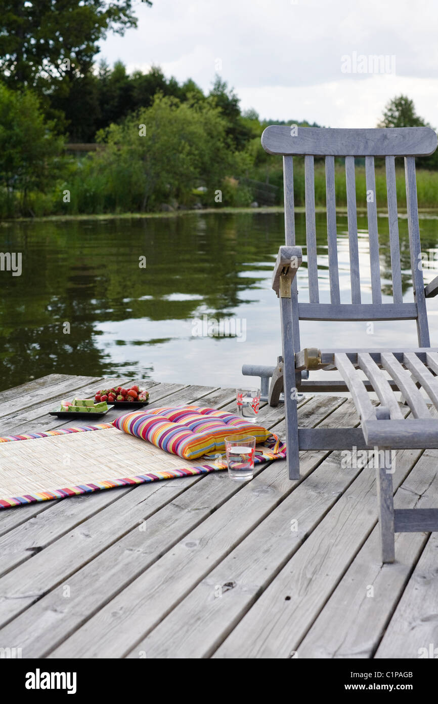 Chaise d'extérieur on jetty Banque D'Images