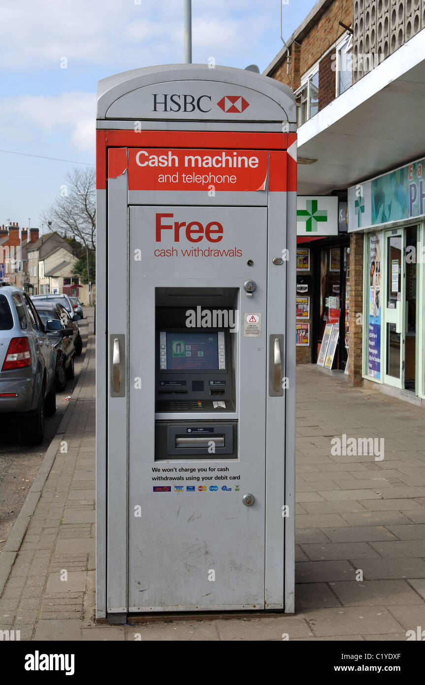 Machine en argent de la HSBC et cabine téléphonique, Earl Shilton, Leicestershire, UK Banque D'Images