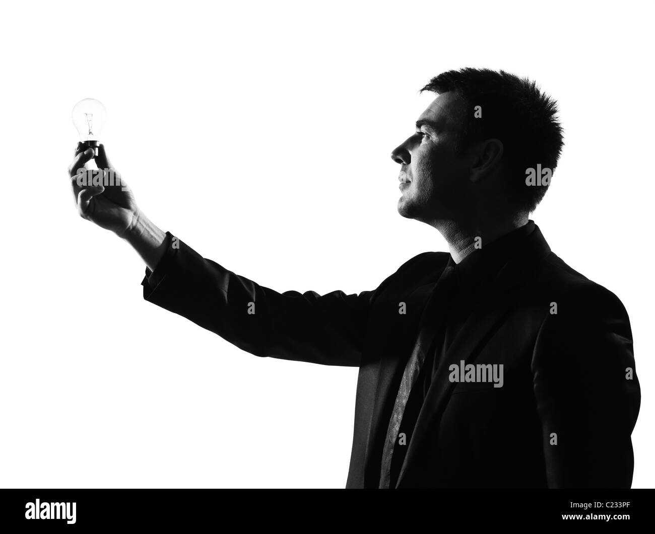 Silhouette caucasian business man holding Light bulb comportement exprimant toute la longueur sur studio isolé sur fond blanc Banque D'Images