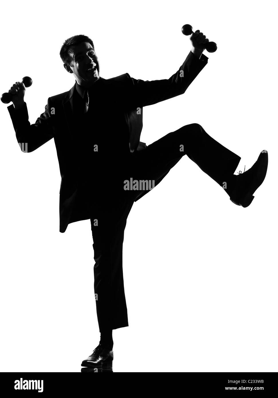 Silhouette caucasian business man exprimant un comportement gagnant sur toute la longueur isolée studio fond blanc Banque D'Images