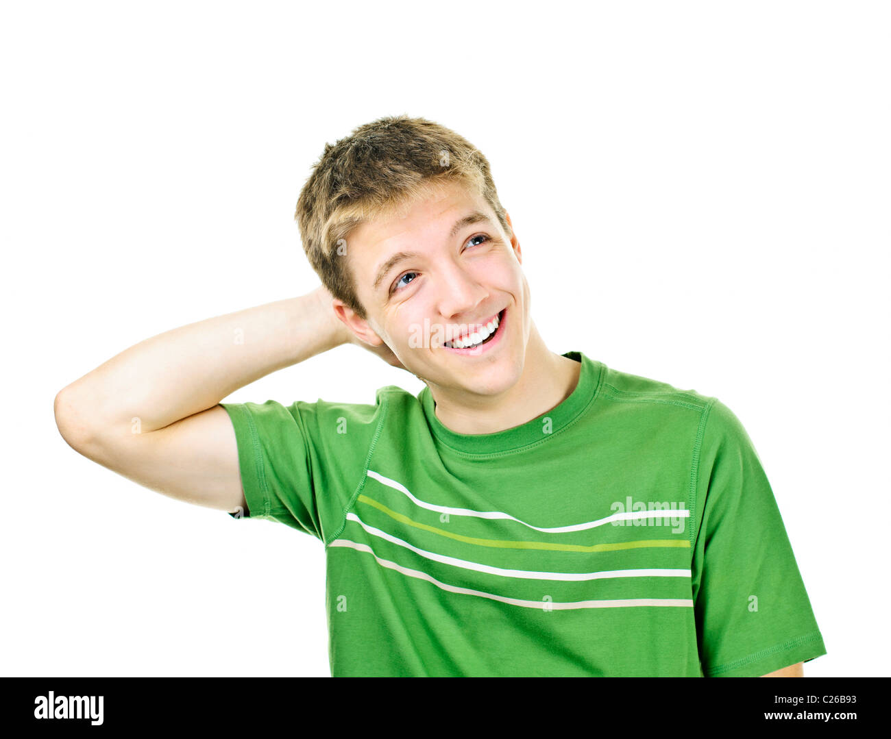 Jeune homme souriant détendue avec la main derrière sa tête isolated on white Banque D'Images