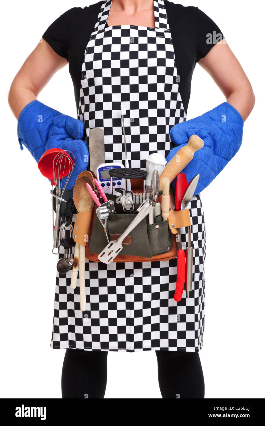 Photo d'un cuisinier portant une ceinture d'outils plein de matériel de cuisine isolé sur un fond blanc. Banque D'Images