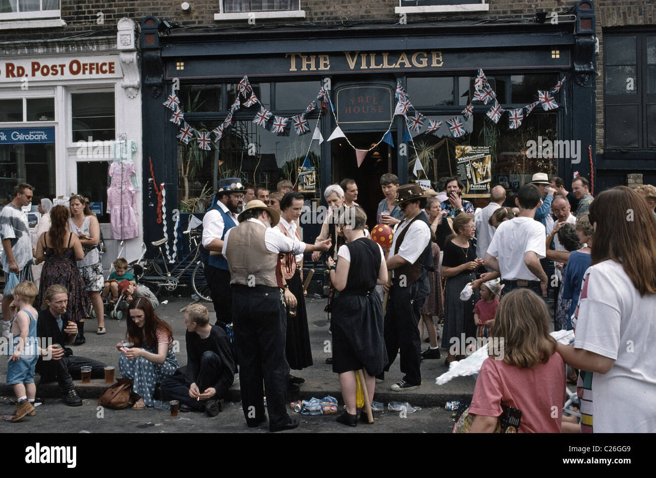 Village de Londres festival de rue avec des musiciens Banque D'Images