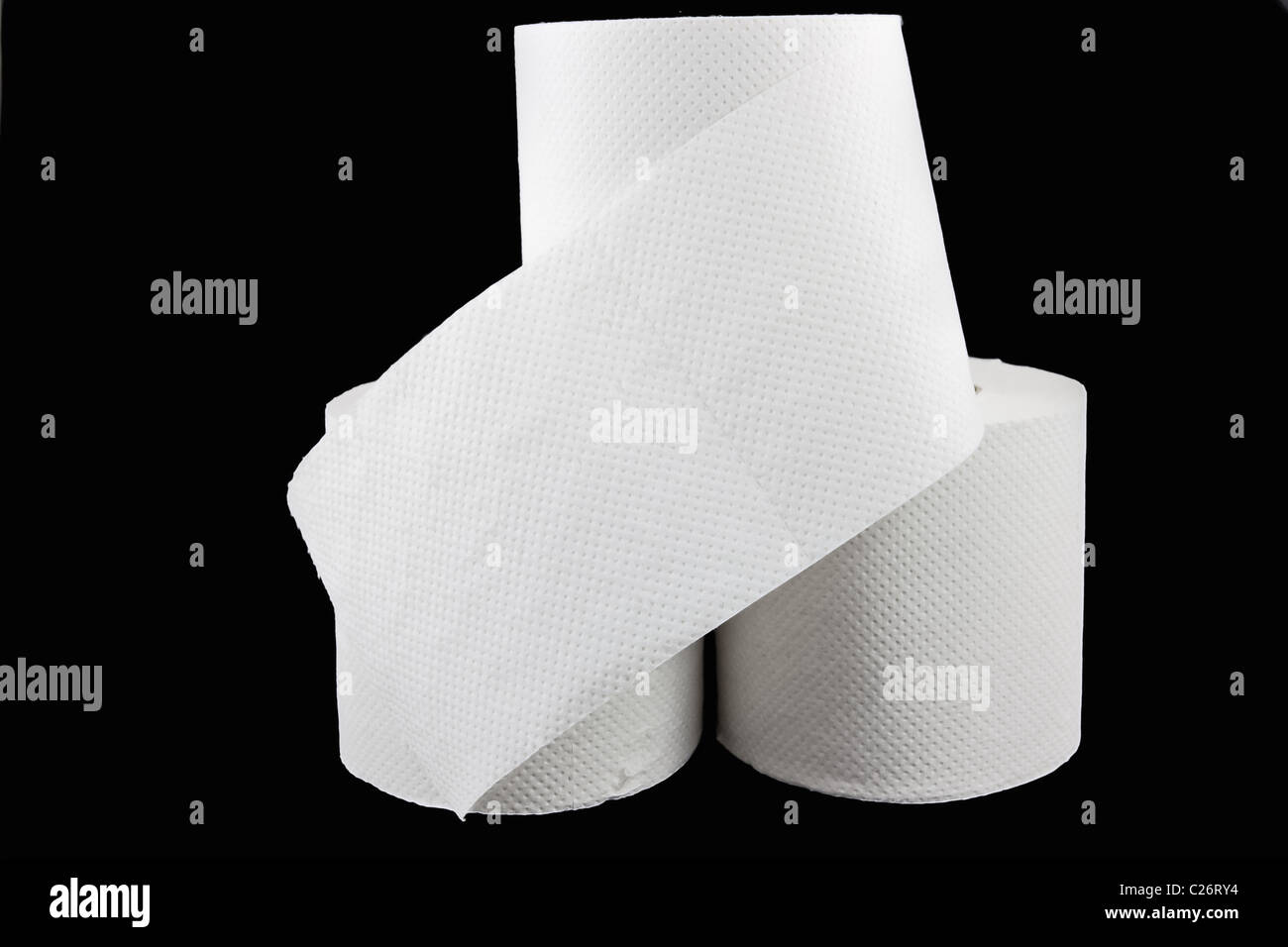 Photo de trois des rouleaux de papier de toilette avec un étui de protection flip Banque D'Images