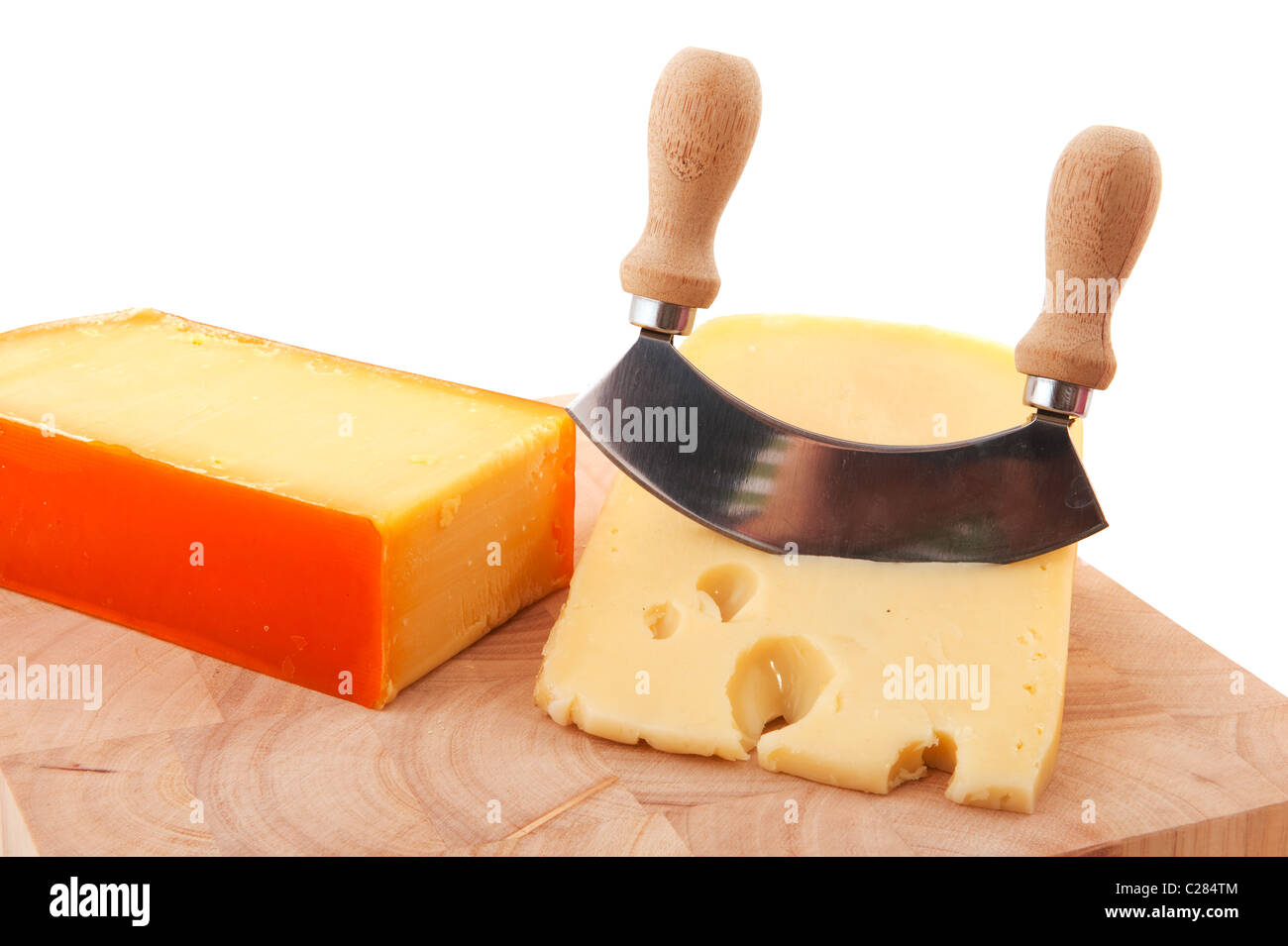 Jeunes et vieux morceaux de fromage en forme de cube Banque D'Images