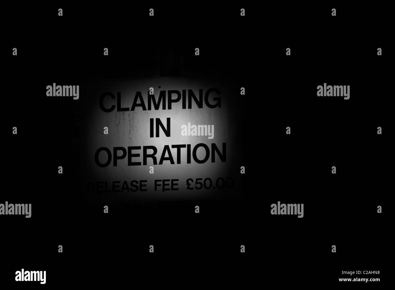 Serrage de roue illuminée signe comme si par torch Banque D'Images