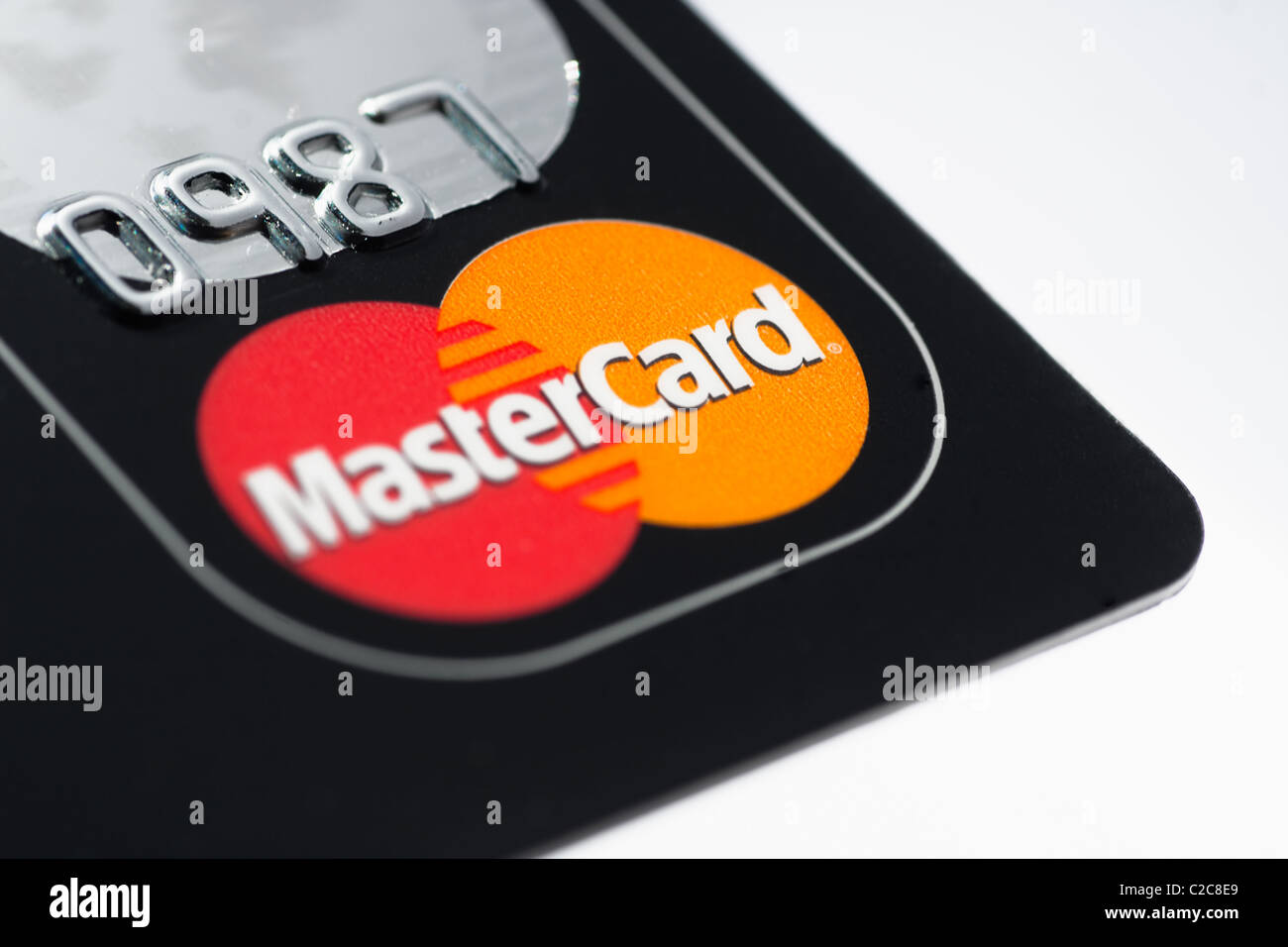 Un gros plan macro sur une carte de crédit Mastercard. Mastercard est une des plus grandes compagnie de carte de crédit Banque D'Images