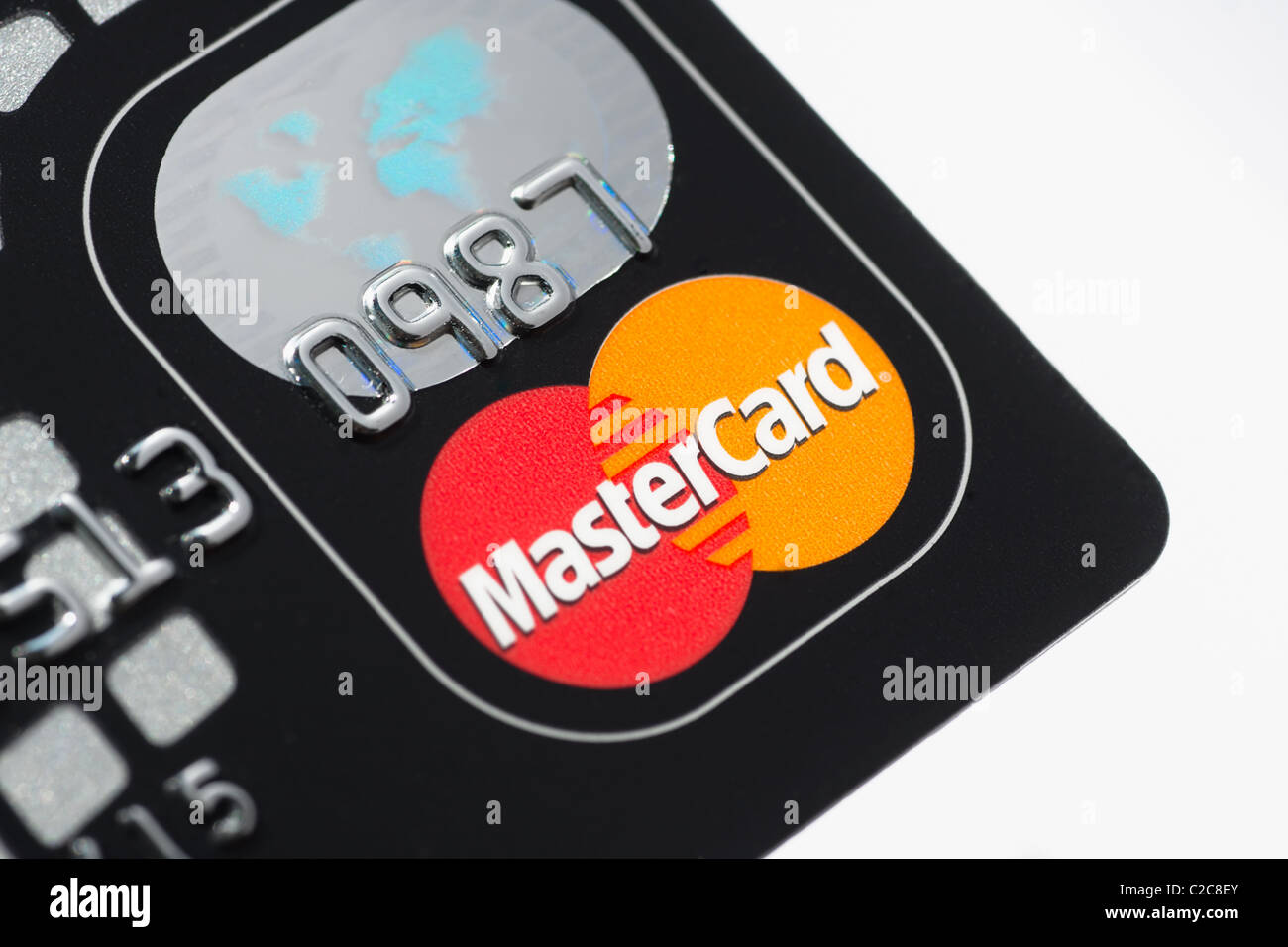 Un gros plan macro sur une carte de crédit Mastercard. Mastercard est une des plus grandes compagnie de carte de crédit Banque D'Images