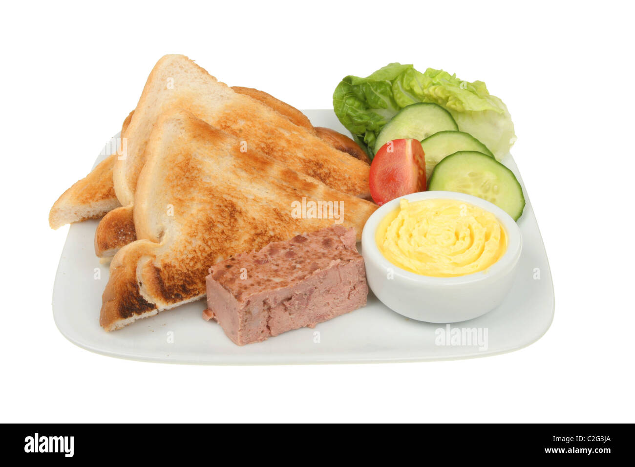 Pate,pain grillé et salade sur une assiette Banque D'Images