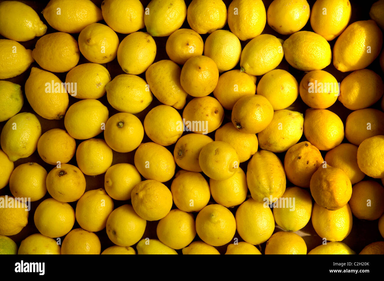 Une masse d'agrumes citrons ovale jaune Banque D'Images