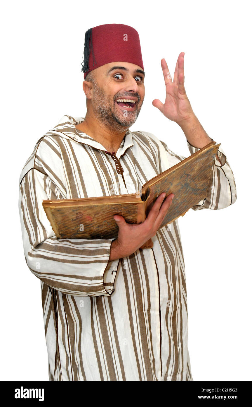 L'homme arabe avec de très vieux livre isolé dans White Banque D'Images