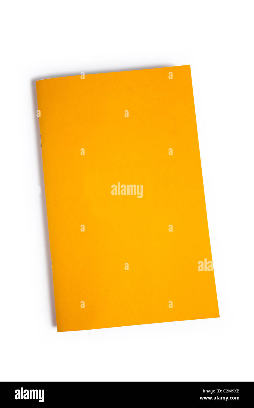 Livre jaune sur fond blanc Banque D'Images