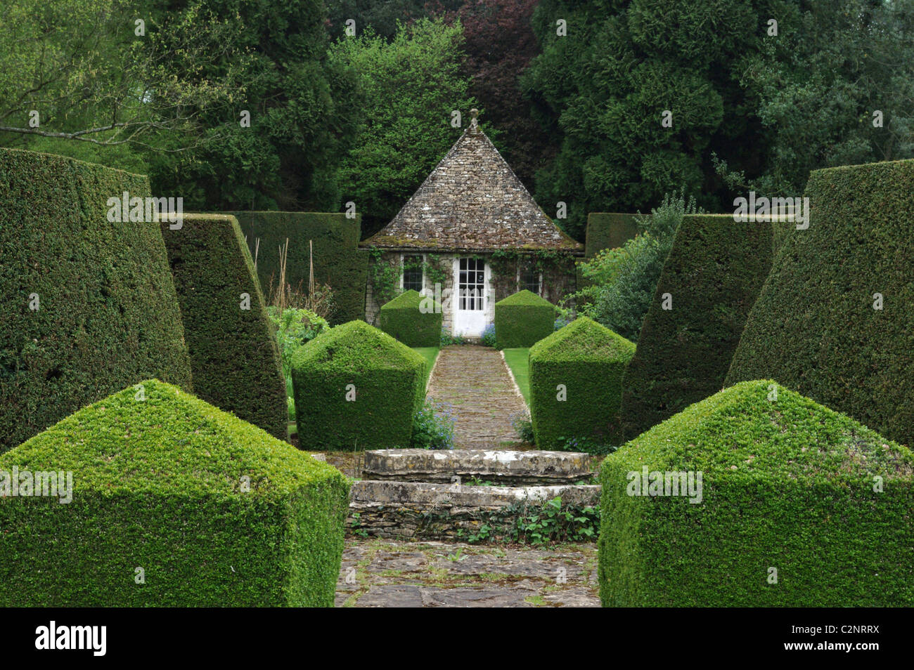 Un jardin à Rodmarton Manor, une maison des arts et métiers près de Cirencester, Gloucestershire, Royaume-Uni Banque D'Images