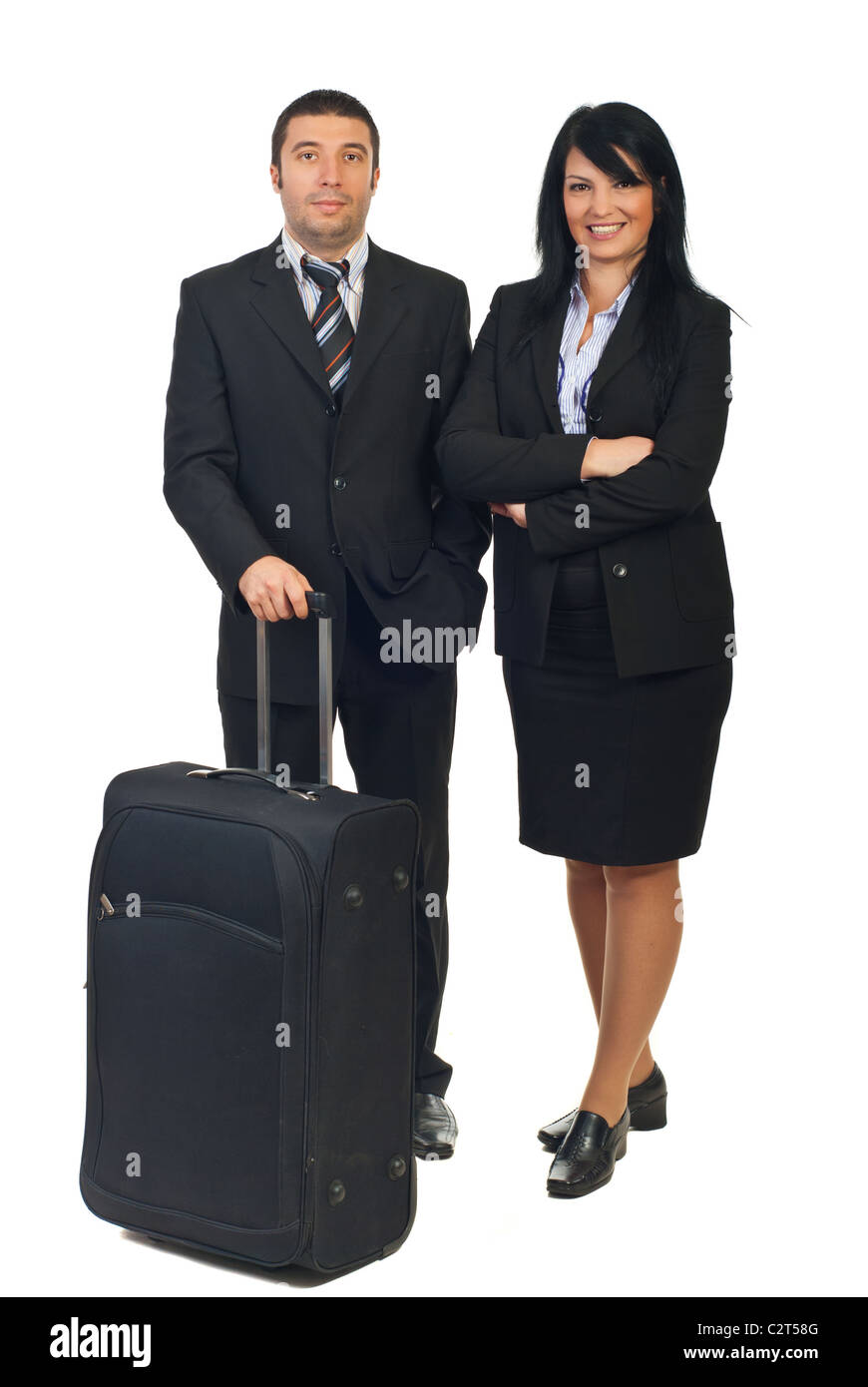 Toute la longueur de deux personnes avec bagages préparer à aller dans un voyage d'affaires isolé sur fond blanc Banque D'Images