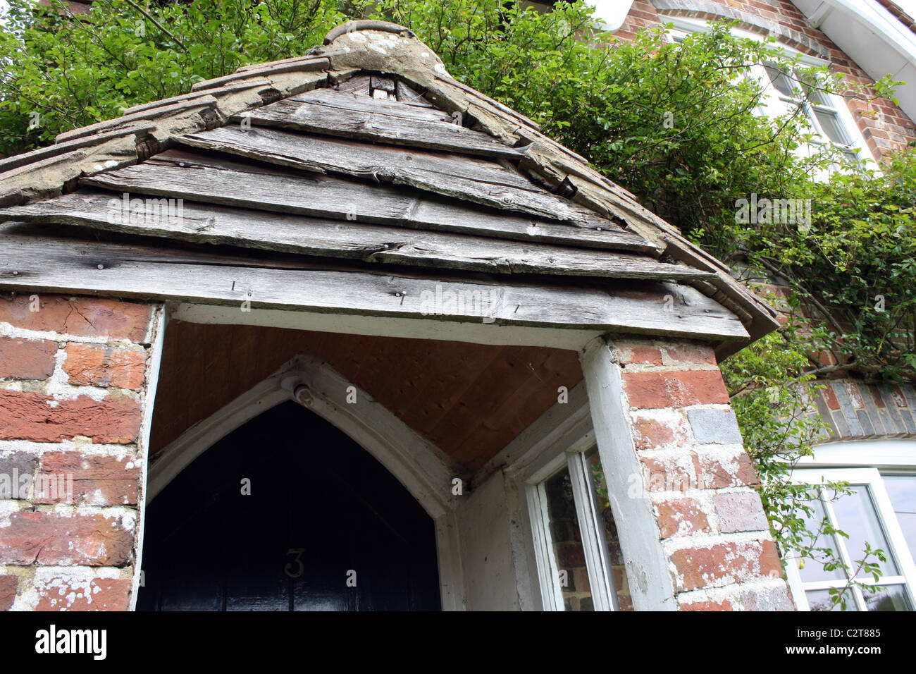 Porche à rouge brique English chalet Cowbeech East Sussex dans le sud de l'Angleterre Banque D'Images