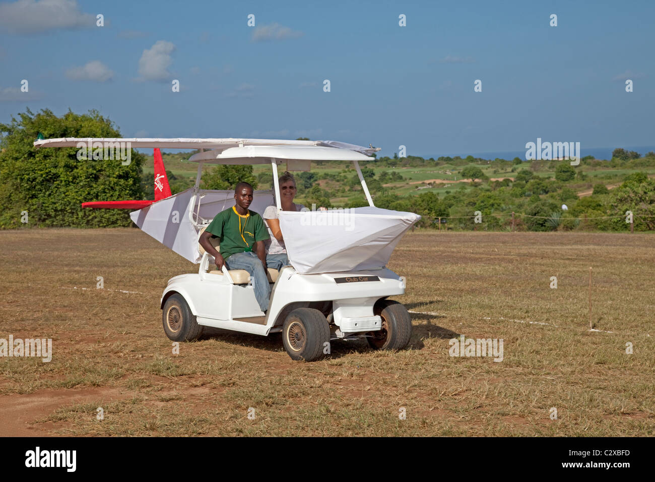 Virgin Atlantic avion buggy donnant randonnées durables Vipingo Ridge Golf Tournament Kenya 2010 Banque D'Images
