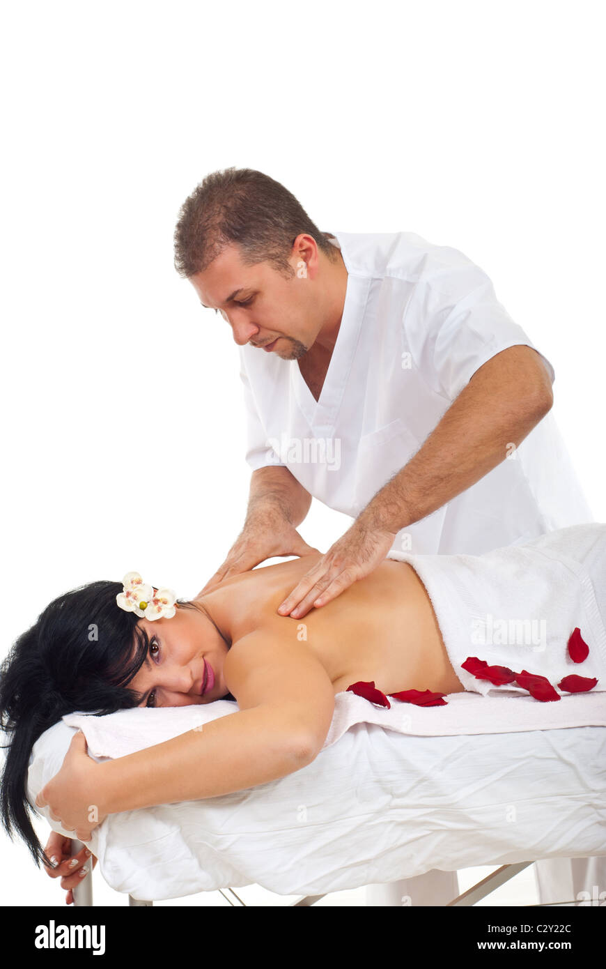 Masseur homme donnant à un massage du dos shiatsu pour se détendre pour une brunette woman at spa resort Banque D'Images