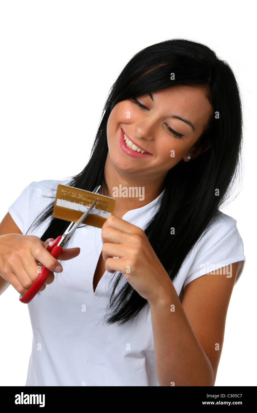 Jeune femme cut up carte de crédit Banque D'Images