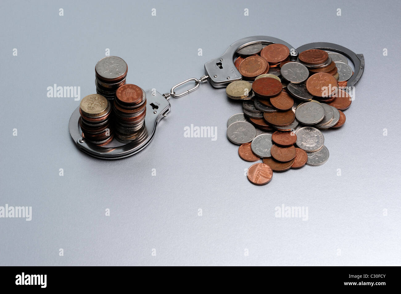 Pièces en menottes Banque D'Images