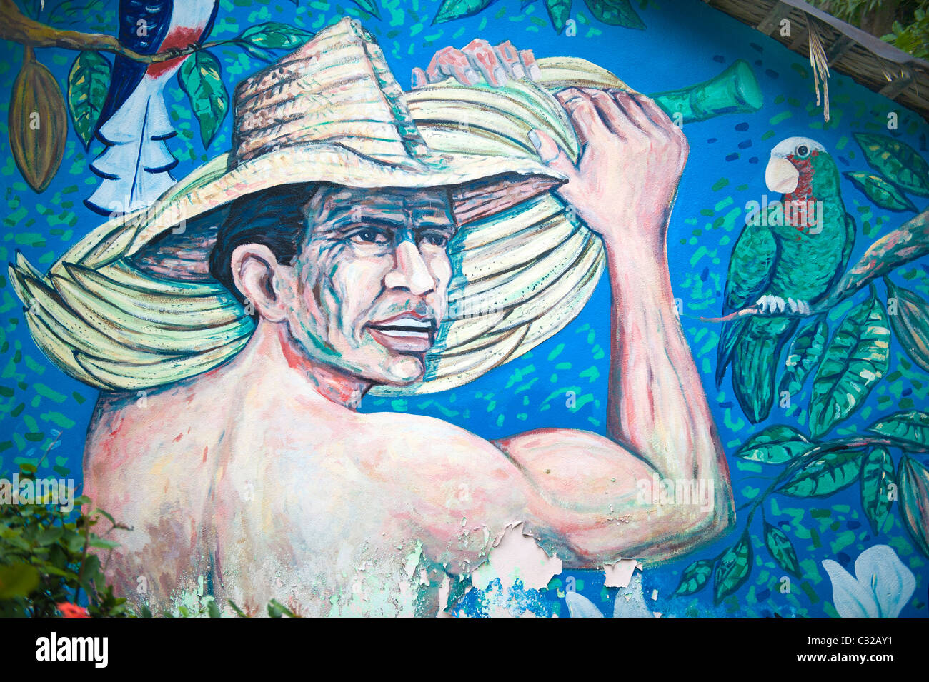 La peinture murale représentant un homme tenant les bananes, Baracoa, Cuba Banque D'Images