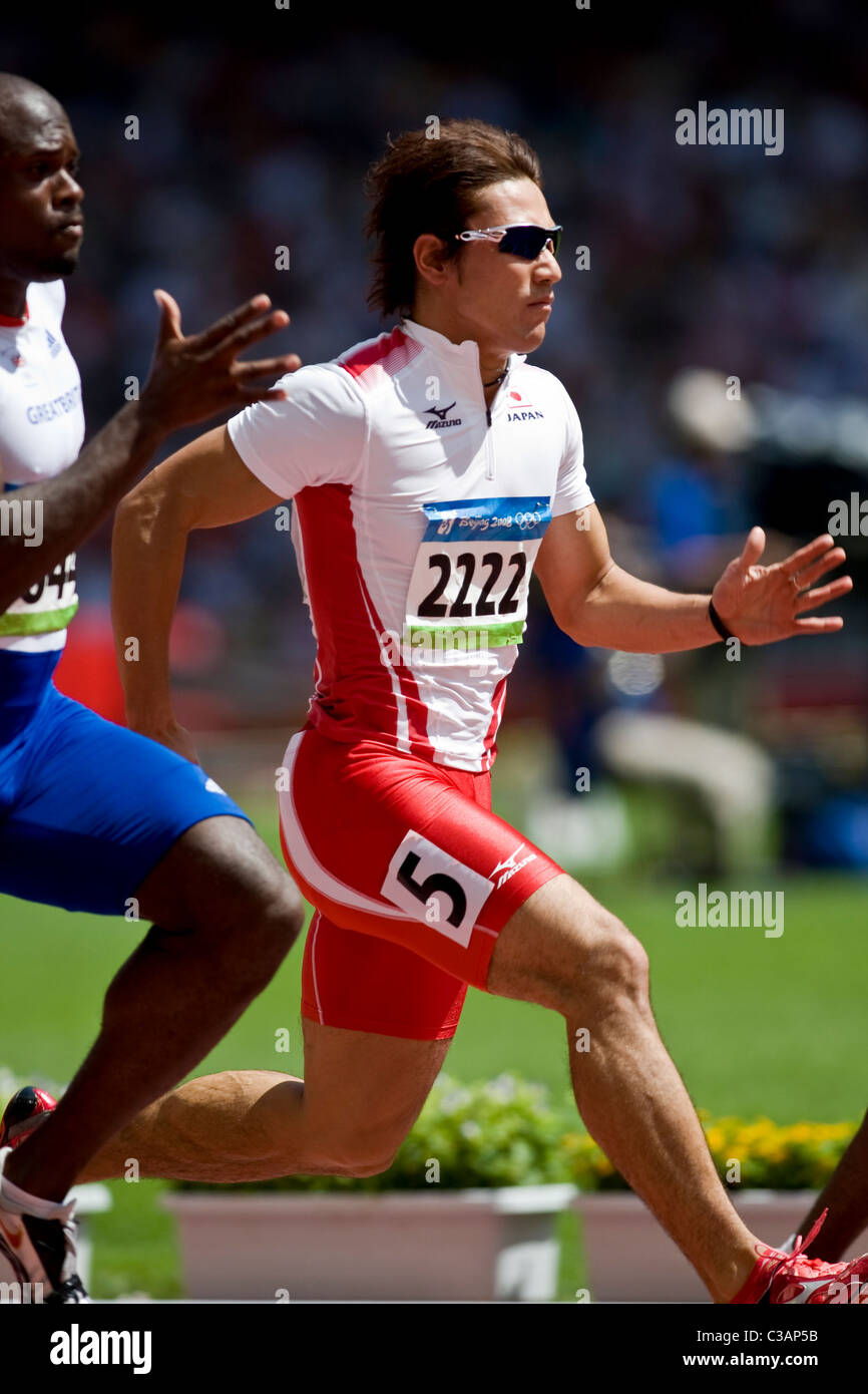 Naoki Tsukahara (JPN) en concurrence au premier tour des 100m au Jeux Olympiques d'été 2008, Pékin, Chine Banque D'Images