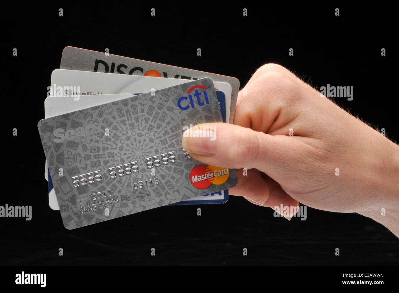 Hand holding credit cards Banque D'Images