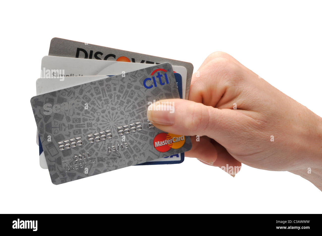 Femme hand holding credit cards Banque D'Images