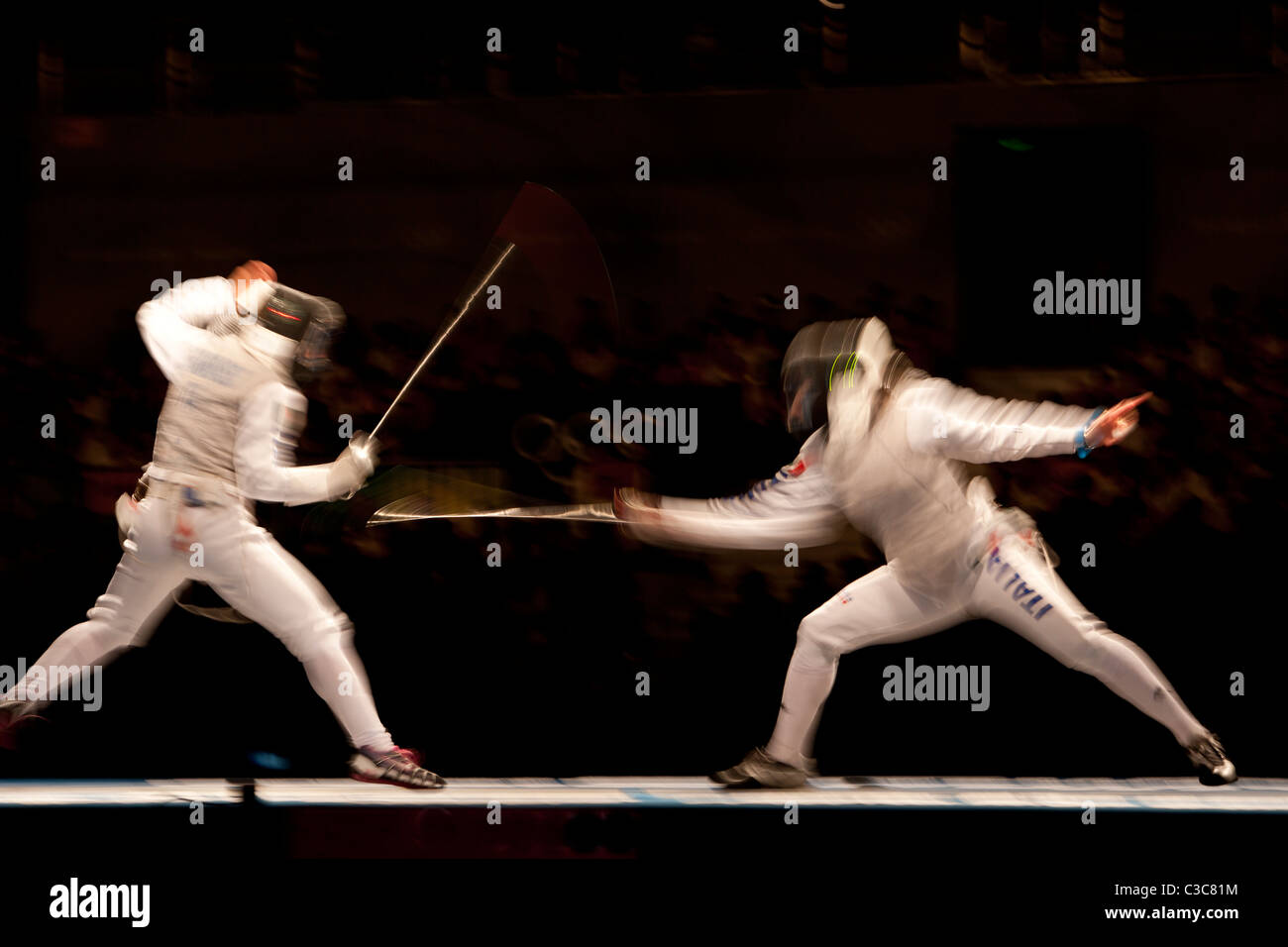 Action menée par des trouble d'escrime au Jeux Olympiques d'été 2008, Pékin, Chine Banque D'Images