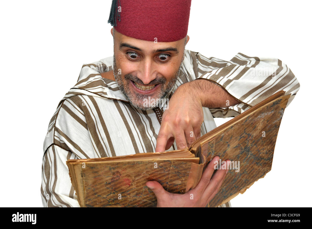 L'homme arabe avec de très vieux livre isolé dans White Banque D'Images