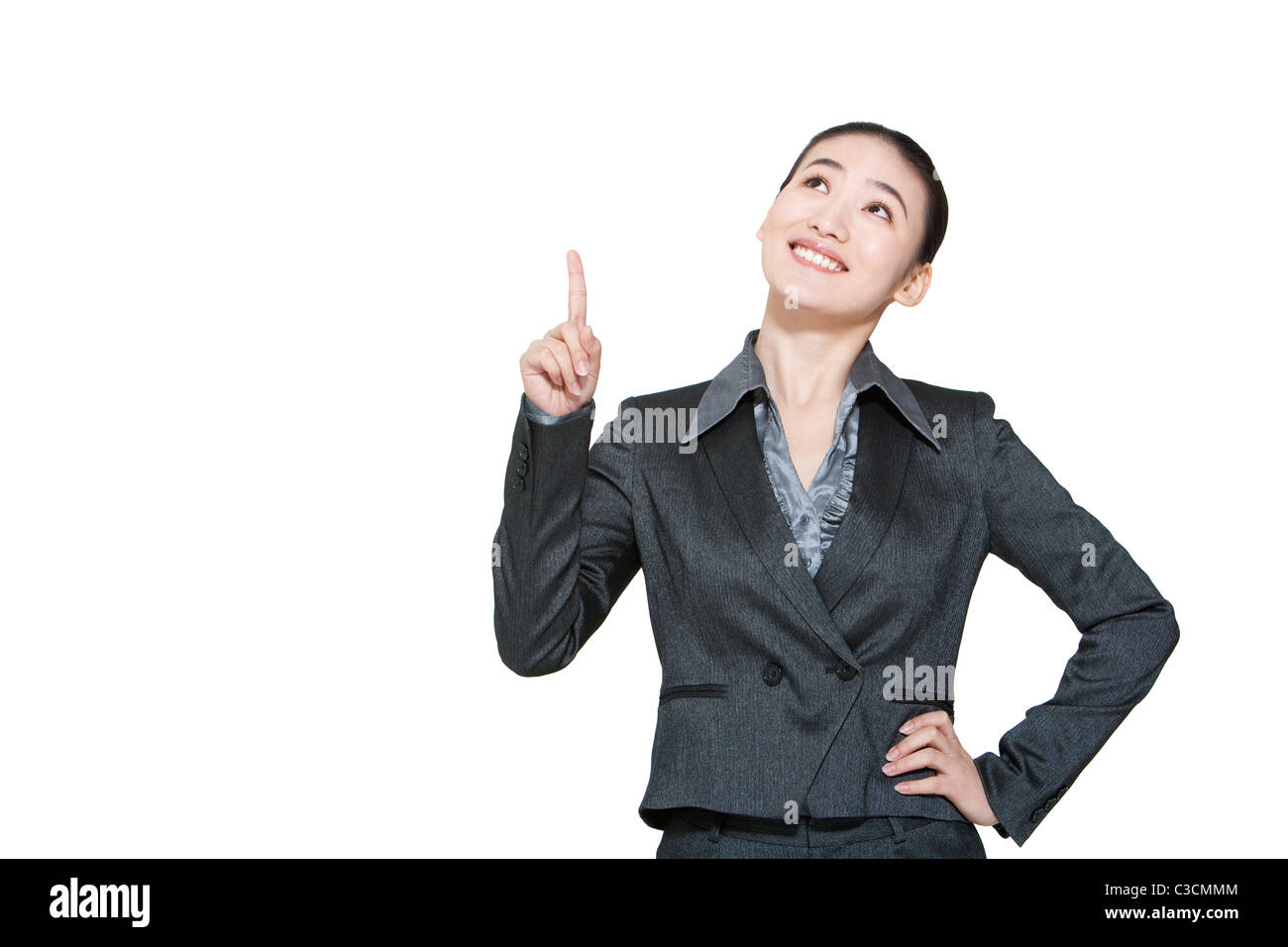 Portrait of a young businesswoman pointing Banque D'Images