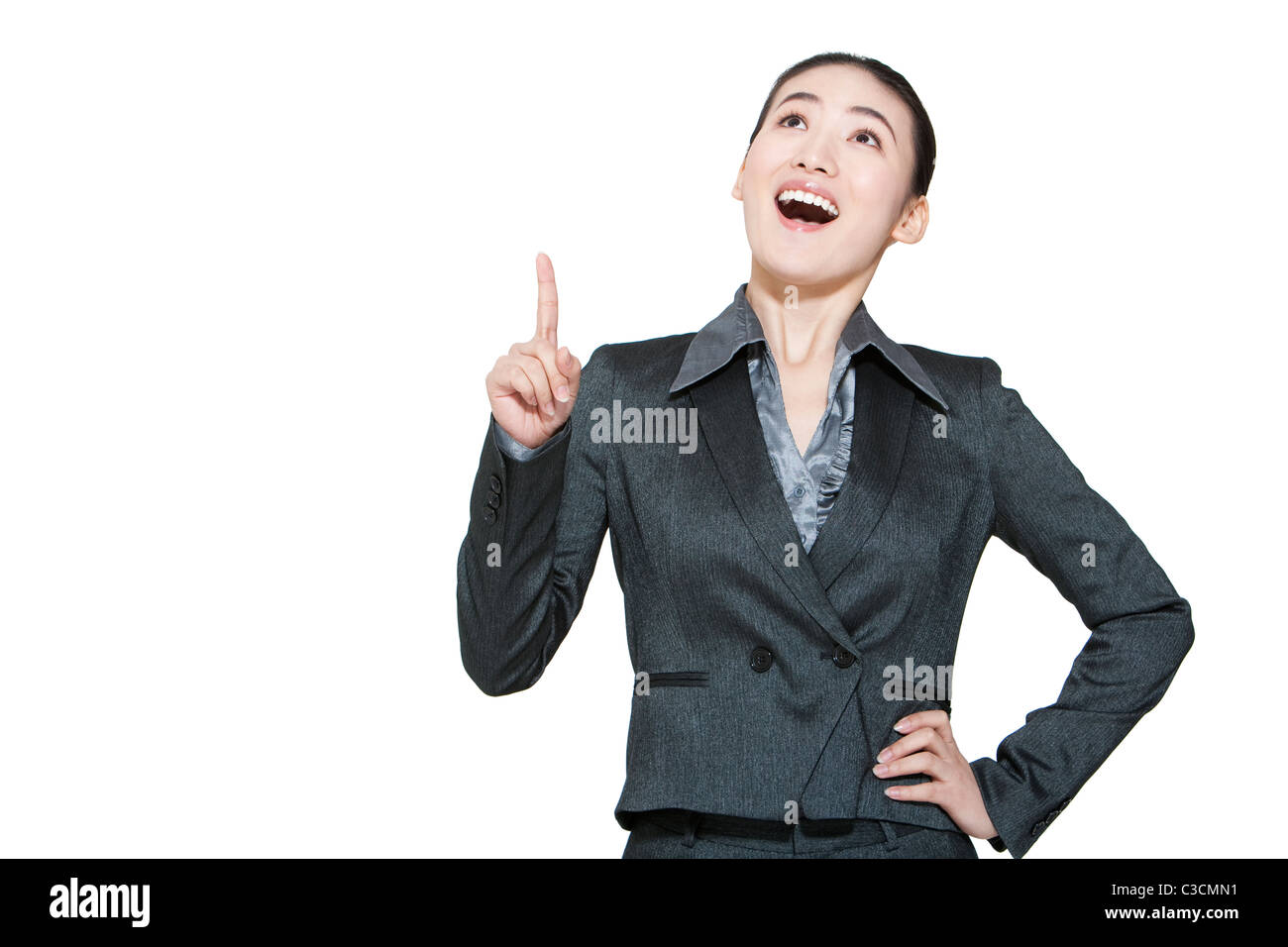 Portrait of a young businesswoman pointing Banque D'Images
