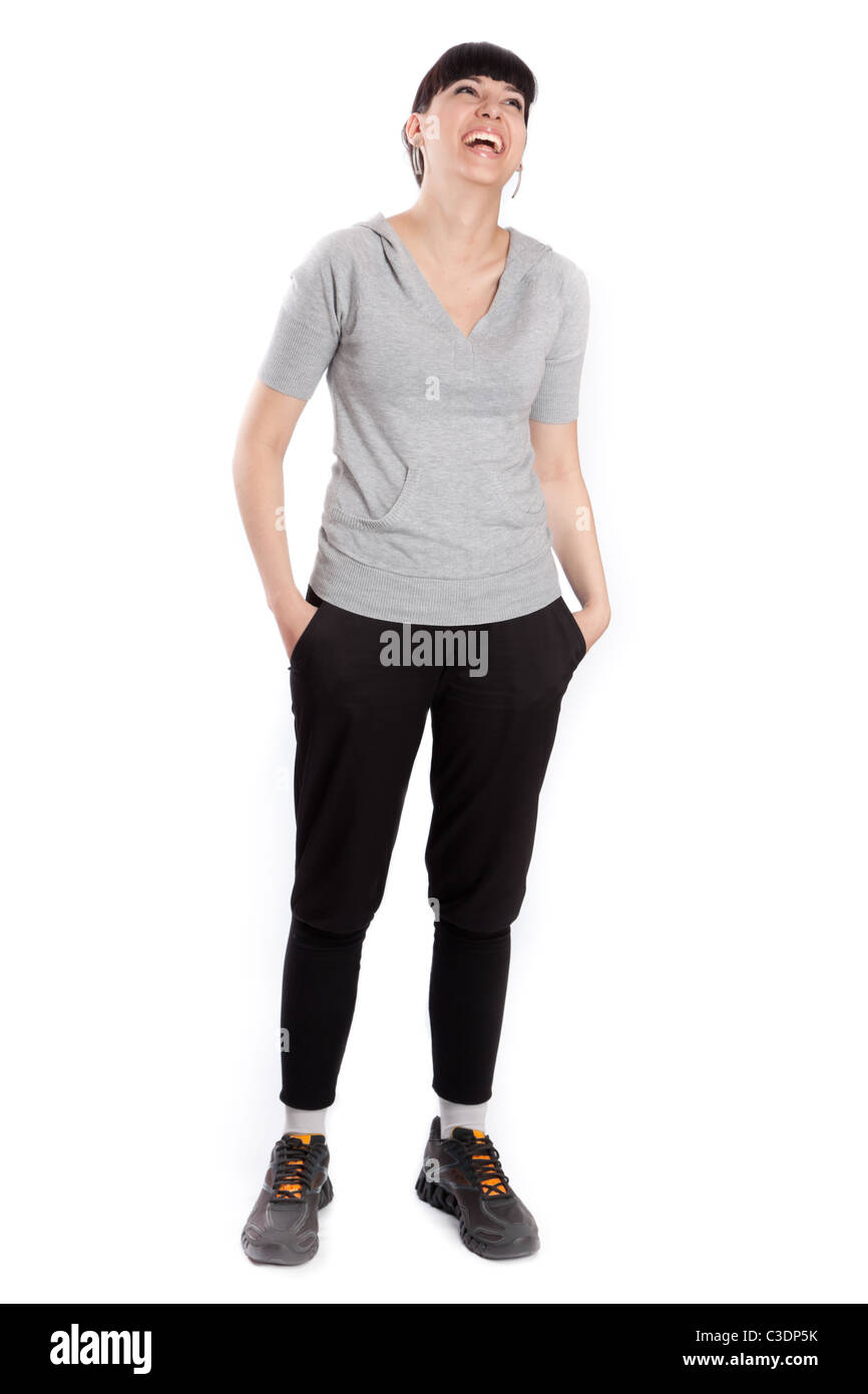 La belle fille de studio sur un fond blanc. Banque D'Images