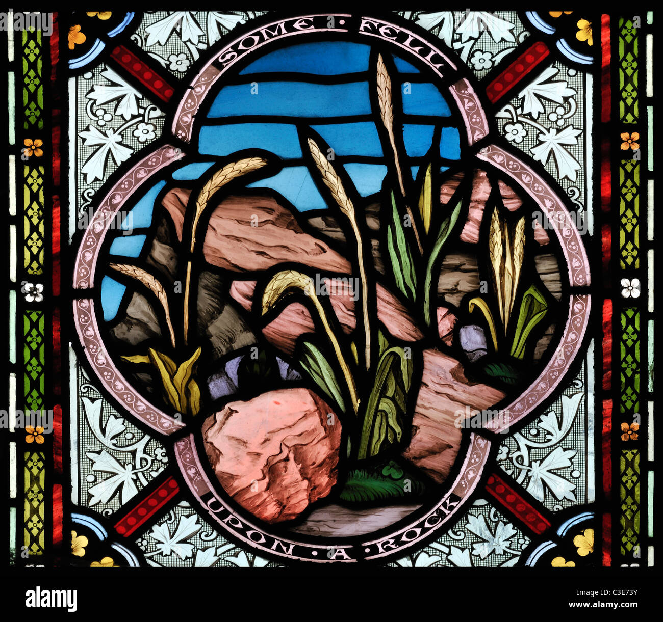 Vitrail représentant 'seeds qui était tombée sur un rocher', l'église St Mary, Burnham Deepdale, Norfolk, Angleterre Banque D'Images