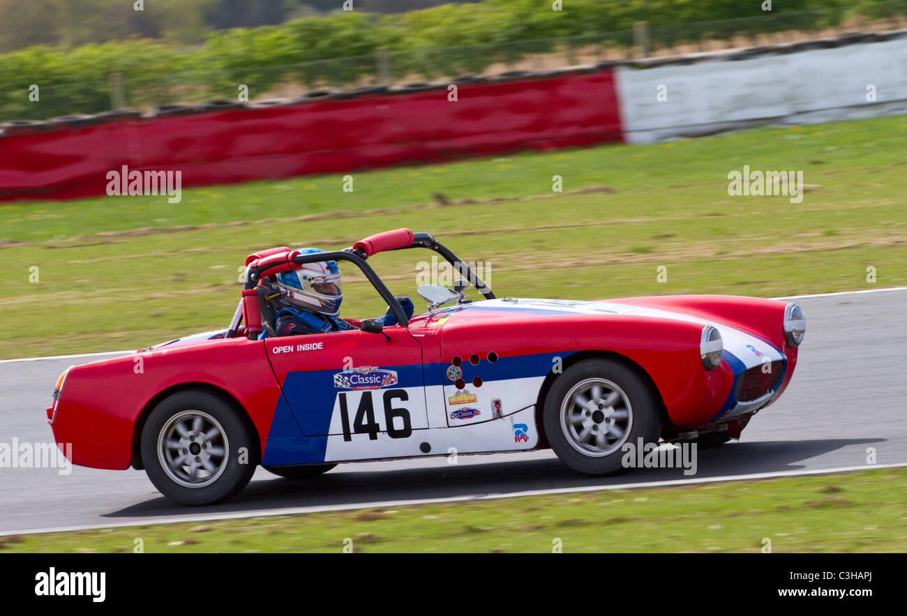 1963 MG Midget Mk1 avec Lenham Sebring/corps pendant la SCLC Swinging Sixties Series de Snetterton, Norfolk, Royaume-Uni. Banque D'Images