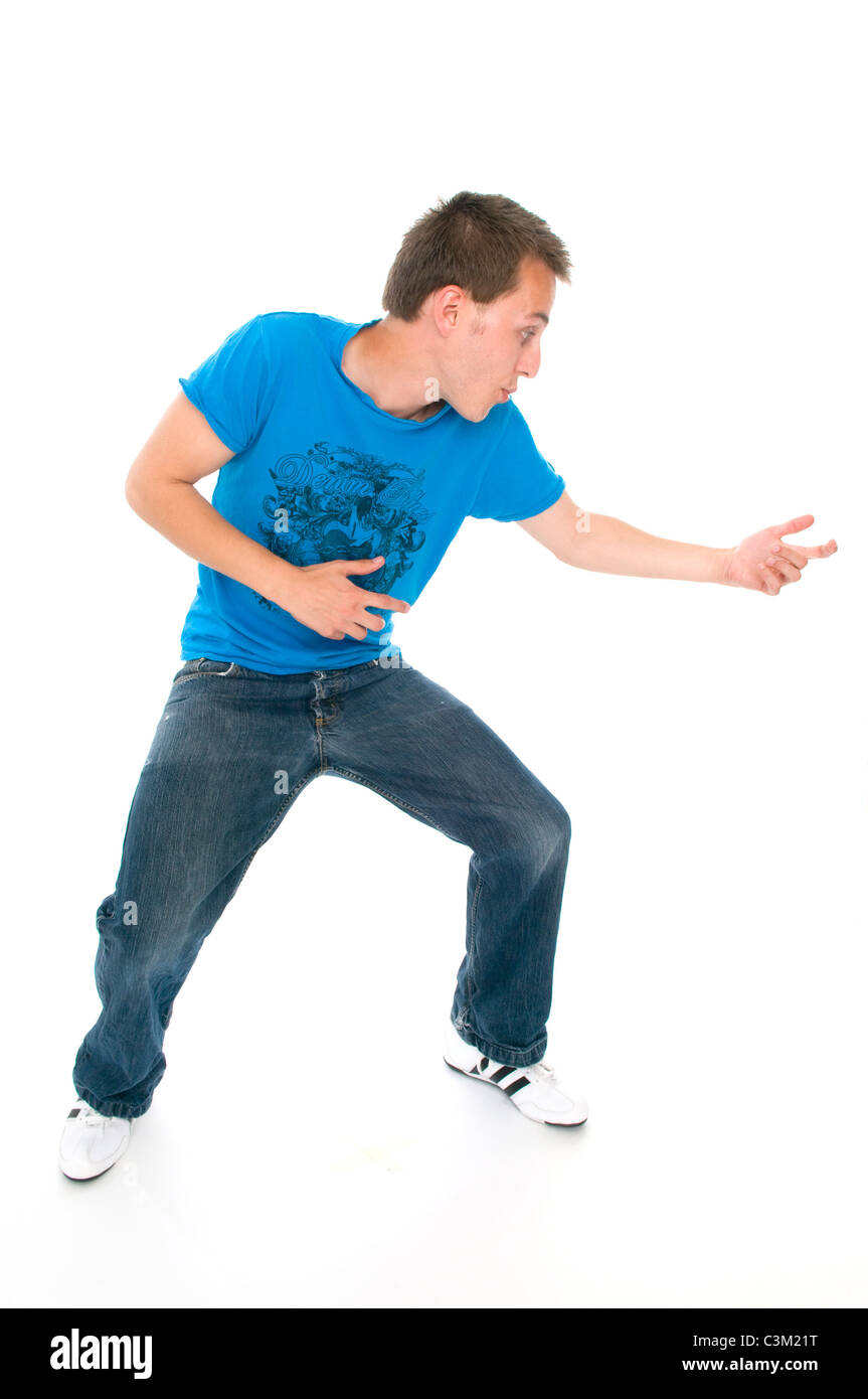 Young man playing air guitar Banque D'Images