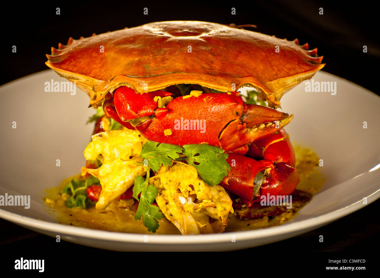 Crabe délicieux accompagné de congee Rockford Sémillon, cinq étoiles, Likuliku Lagoon Resort, Mololo, Fidji, îles Mamanucas Banque D'Images