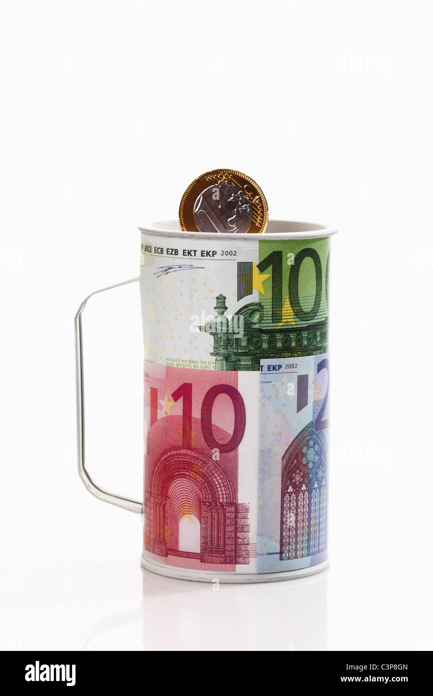 La charité peut avec pièce en euro, close-up Banque D'Images