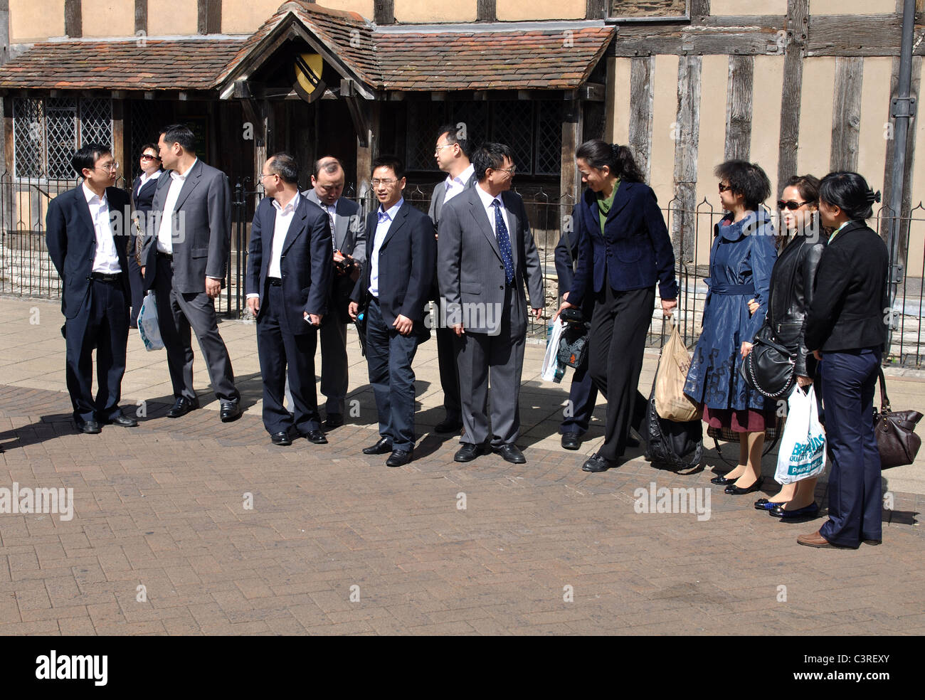 Un groupe de touristes chinois à Stratford-upon-Avon, Royaume-Uni Banque D'Images