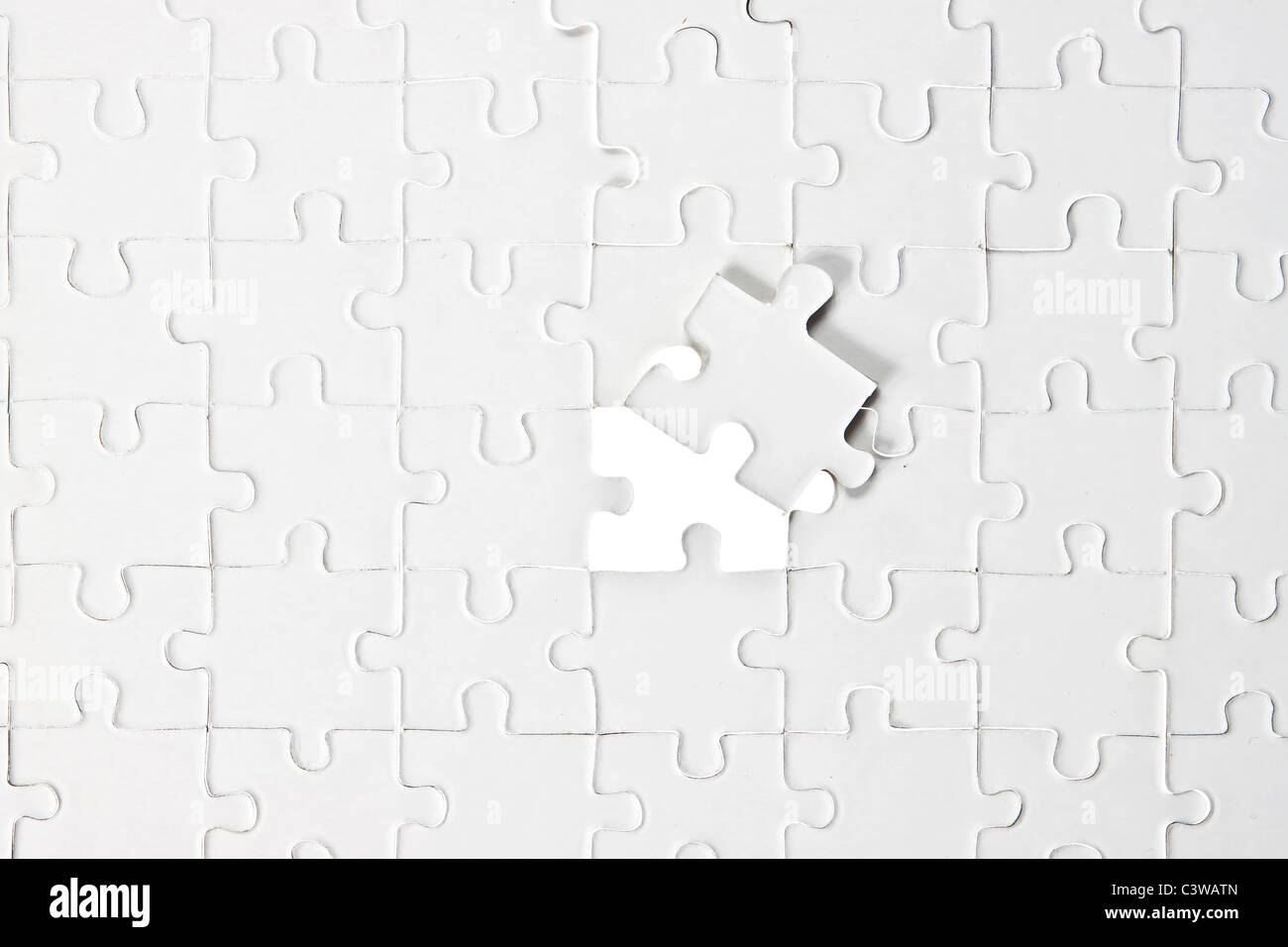 Un casse-tête avec une partie manquante, qui va être ajouté Banque D'Images