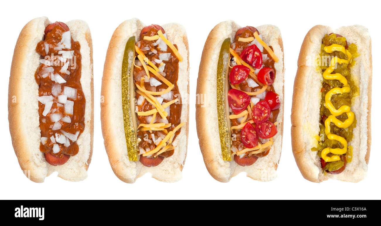 Une collection de hot-dogs à la moutarde, relish, ketchup, relish, le piment et les oignons. Banque D'Images