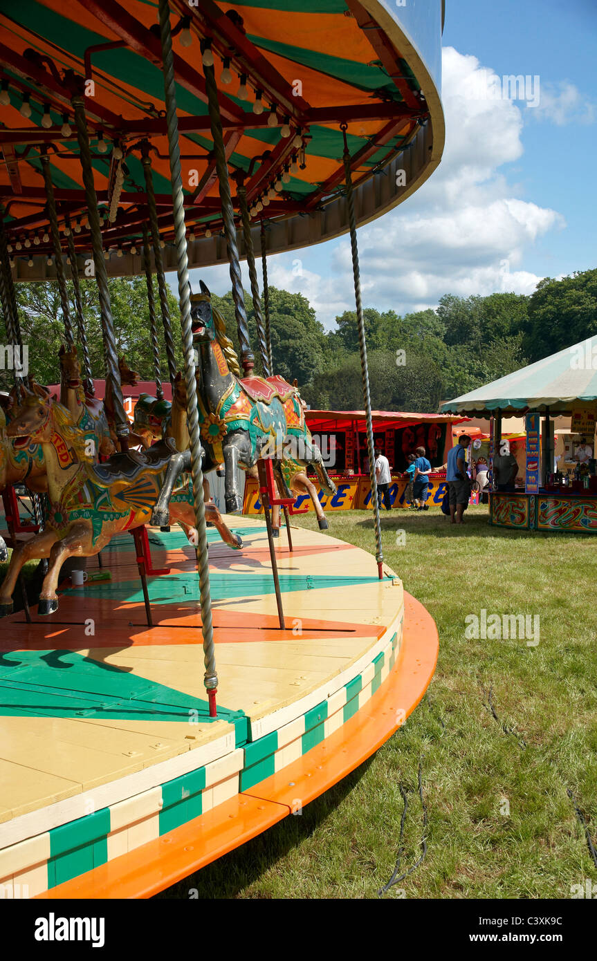 Chevaux de bois savent comme 'gallopers' sur une foire traditionnelle lors d'une ride et vapeur vintage rally. Banque D'Images