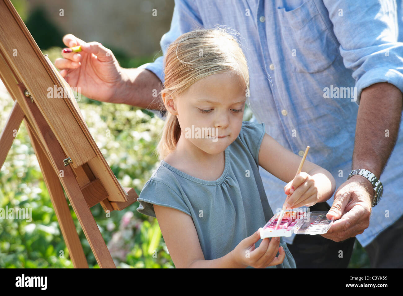 Grand-père et sa petite-fille peinture Banque D'Images