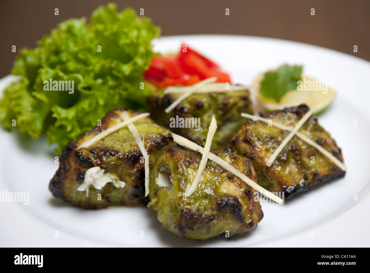 La cuisine indienne du poisson grillé Banque D'Images