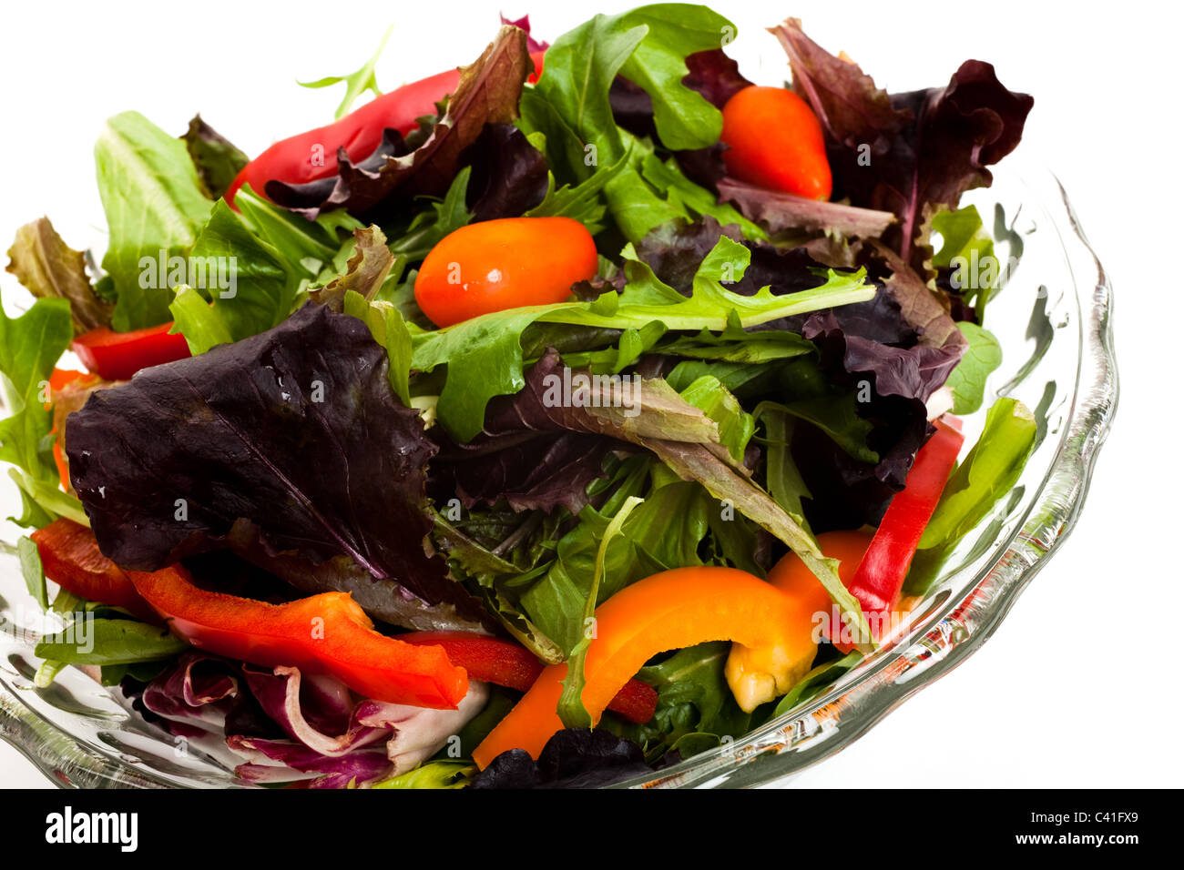 Salade, laitue, tomate, mizuna pour le fond Banque D'Images