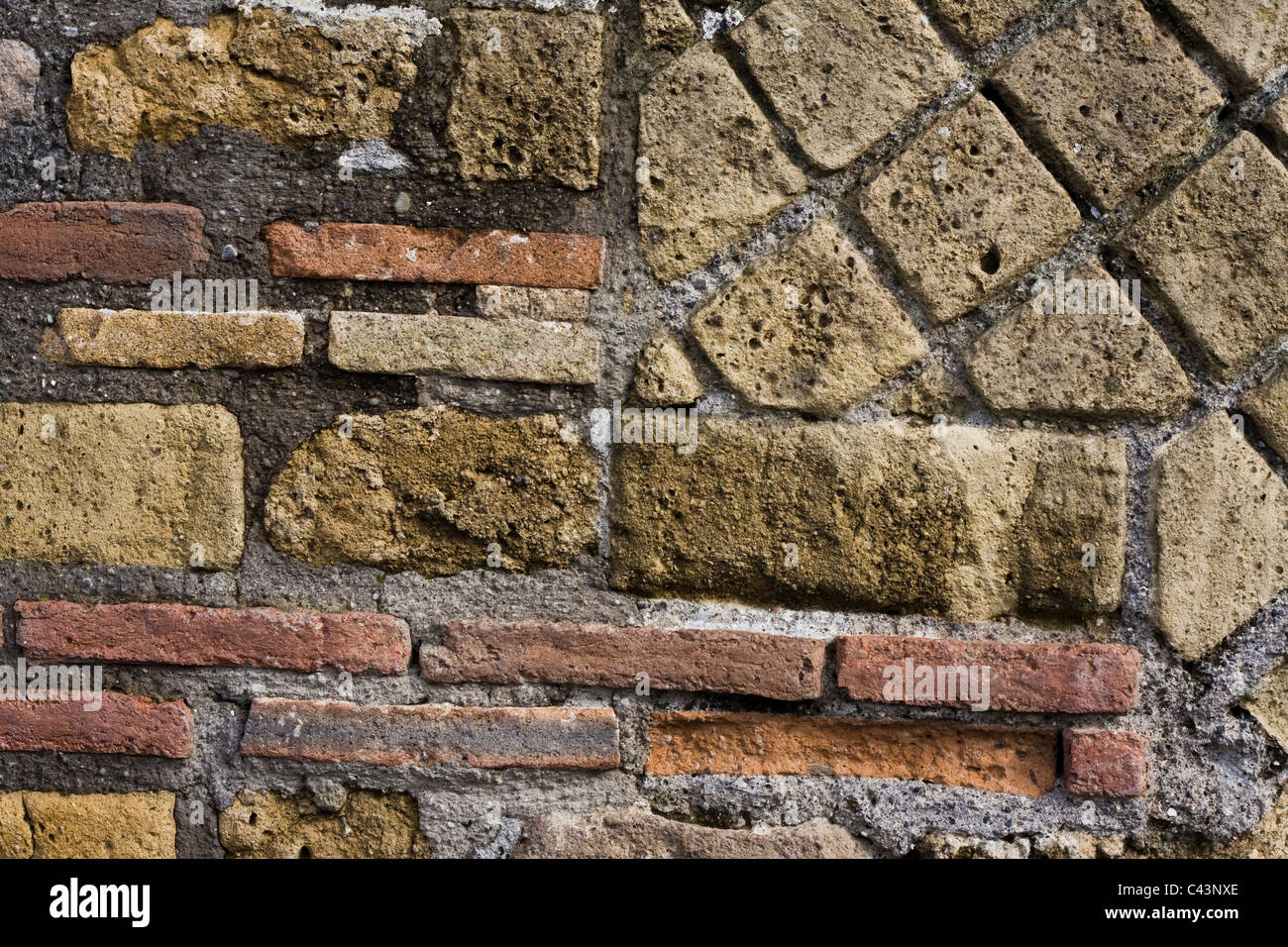 Mur de bâtiment en ruine Pompéi Banque D'Images