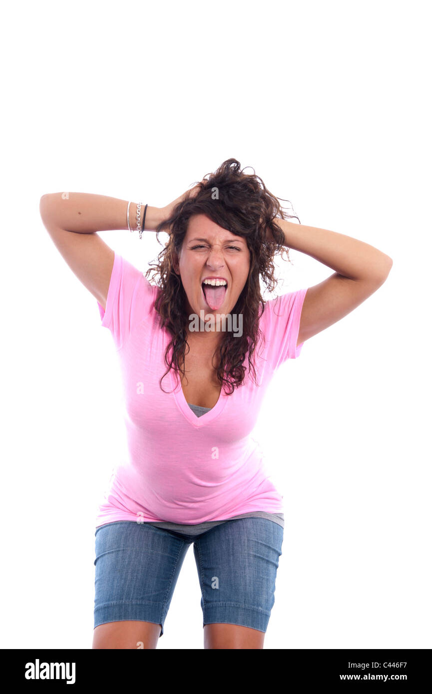 Studio Shot, version, cut-out, d'arrière-plan blanc, portrait, femme, aux cheveux bruns, se déplace, cheveux foncés, verrous, T-shirt, rose, Jeans, l Banque D'Images