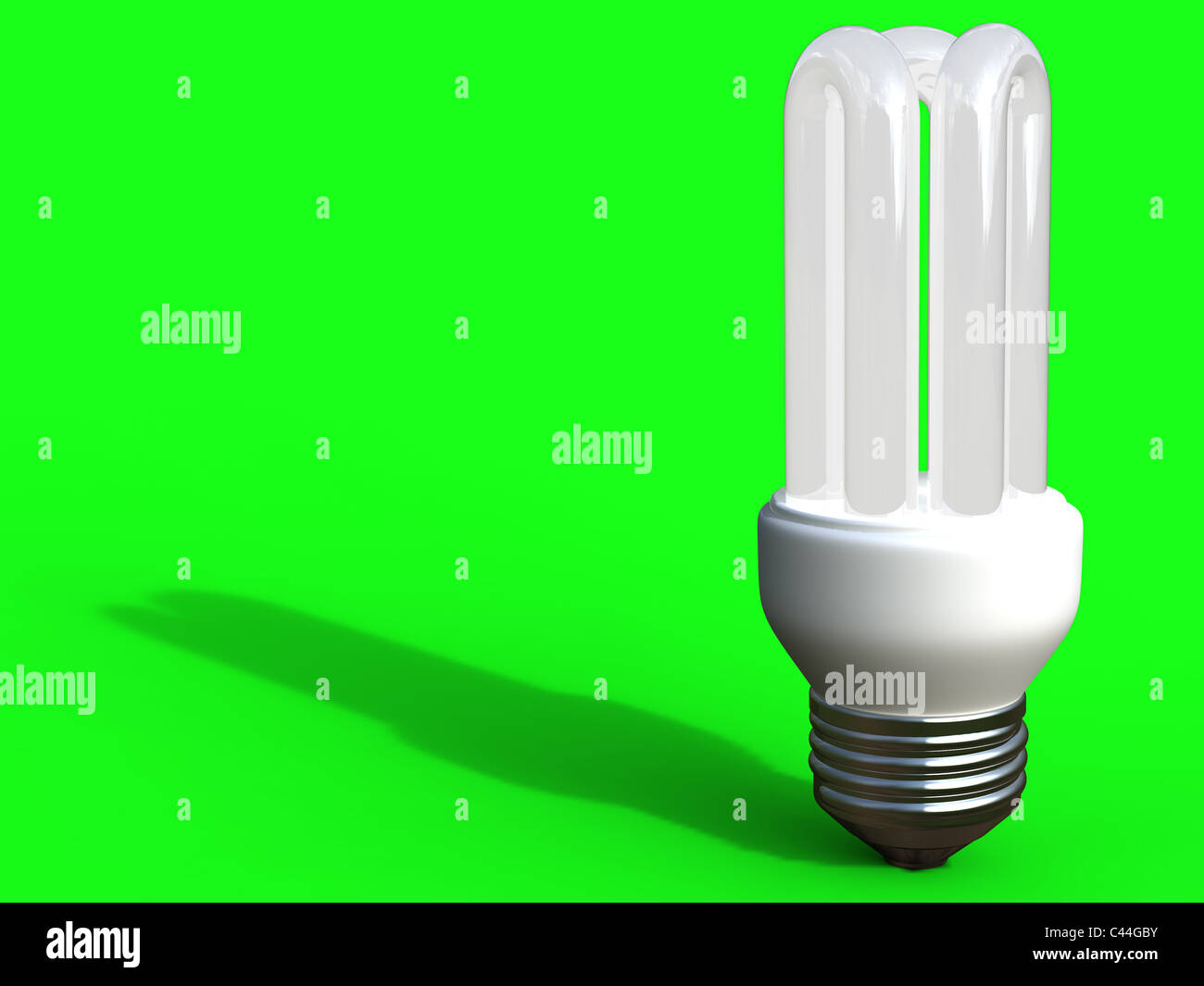 Ampoule à économie d'énergie sur fond vert Banque D'Images